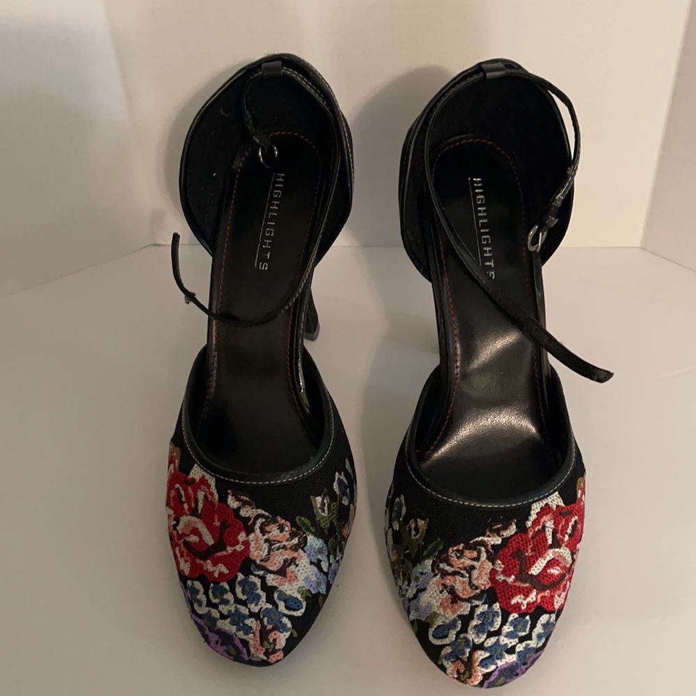 Black dress heels with floral print.